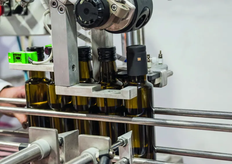 Glass bottles on the Oleícola Álvarez bottling line